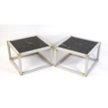 A pair of mid / late 20thC coffee tables with inset fossil marble tops, metal caps to the corners,