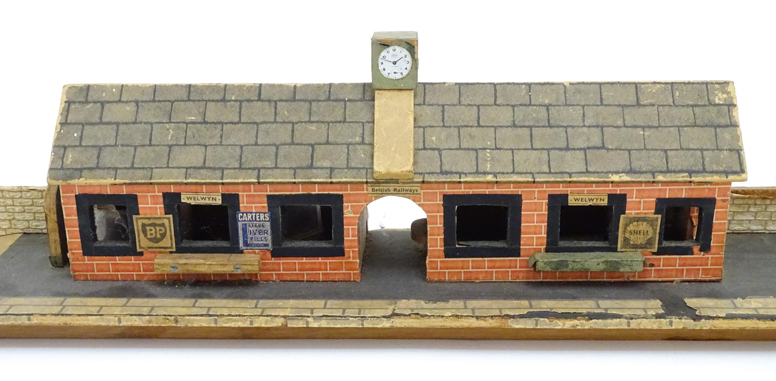 Toys: A 20thC scratch built wooden model railway station / platform with various adverts for - Bild 3 aus 10