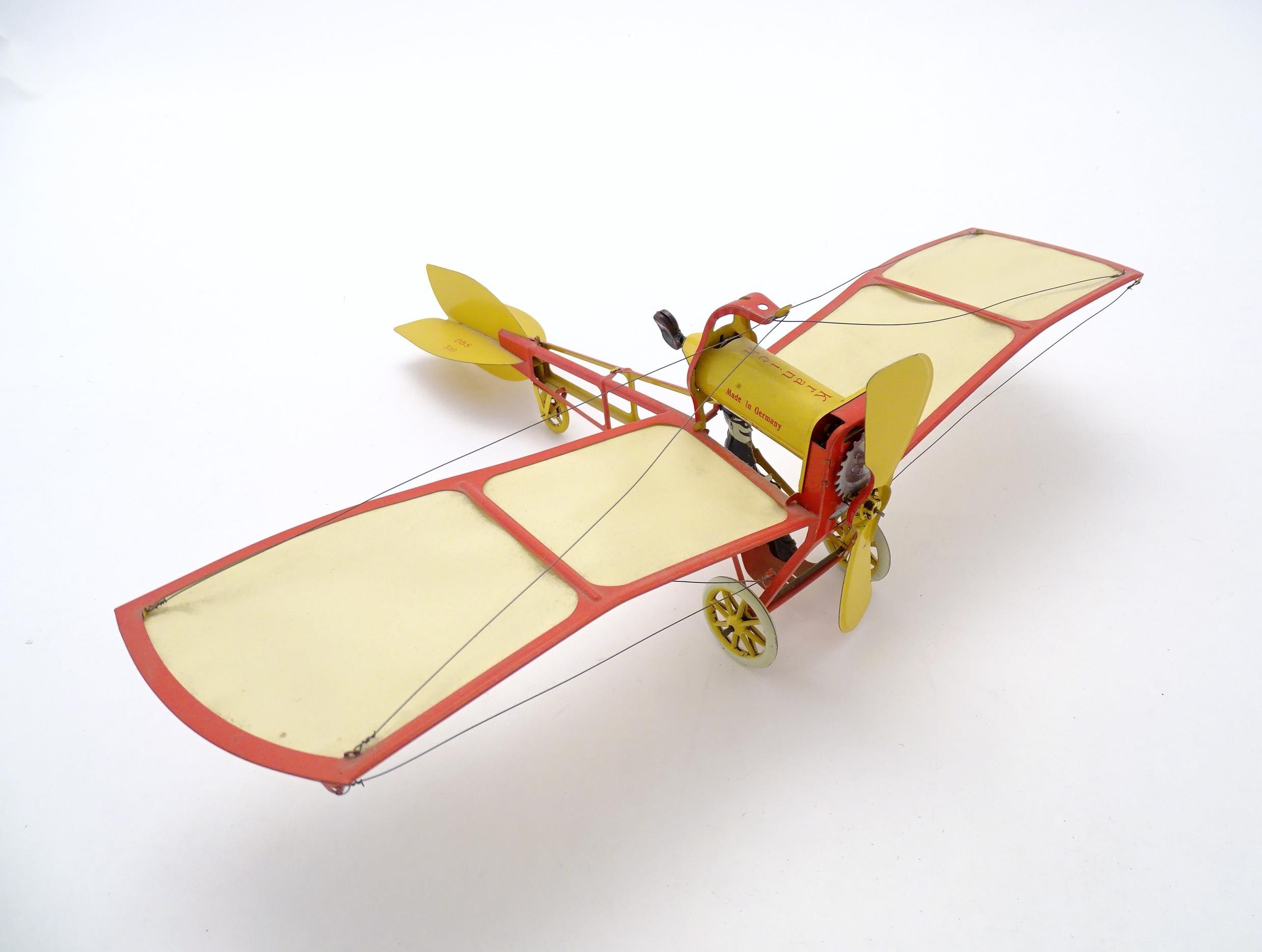 Toy: A 20thC German tinplate clockwork monoplane / aeroplane, Kranich 310. Made by Dusseldorfer - Bild 7 aus 11