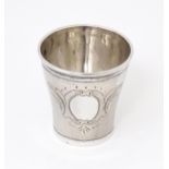 A late 19thC / early 20thC Austro Hungarian silver tot cup with engraved decoration. Marked under