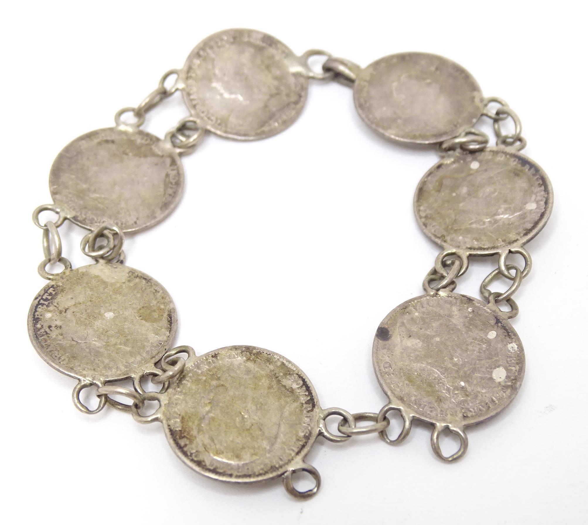 A silver and white metal bracelet set with Victorian and later 3 pence coins. Together with a silver - Image 3 of 7