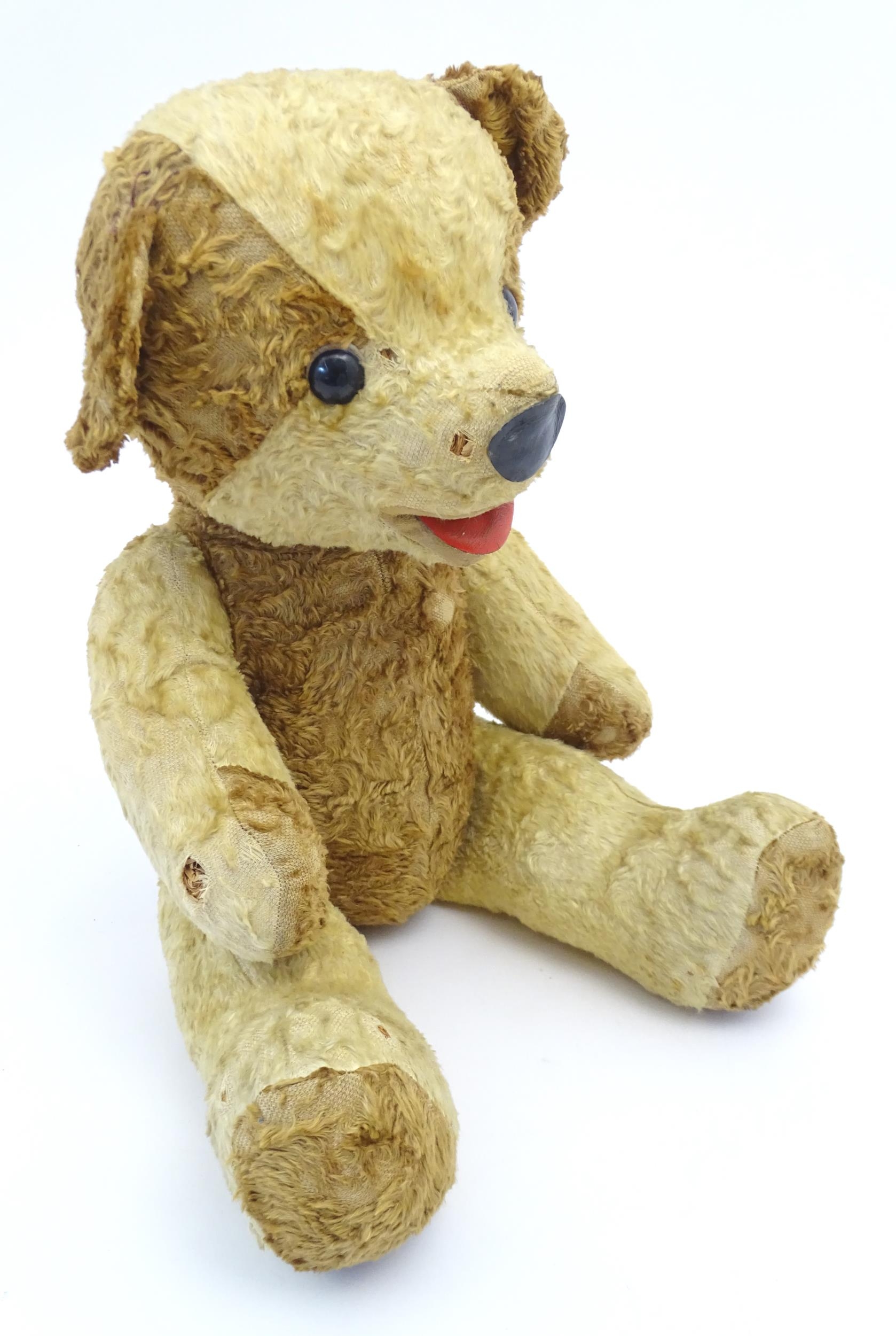 Toy: A 20thC straw filled teddy bear with leather tongue and articulated limbs. Approx. 22 1/2" - Bild 7 aus 7