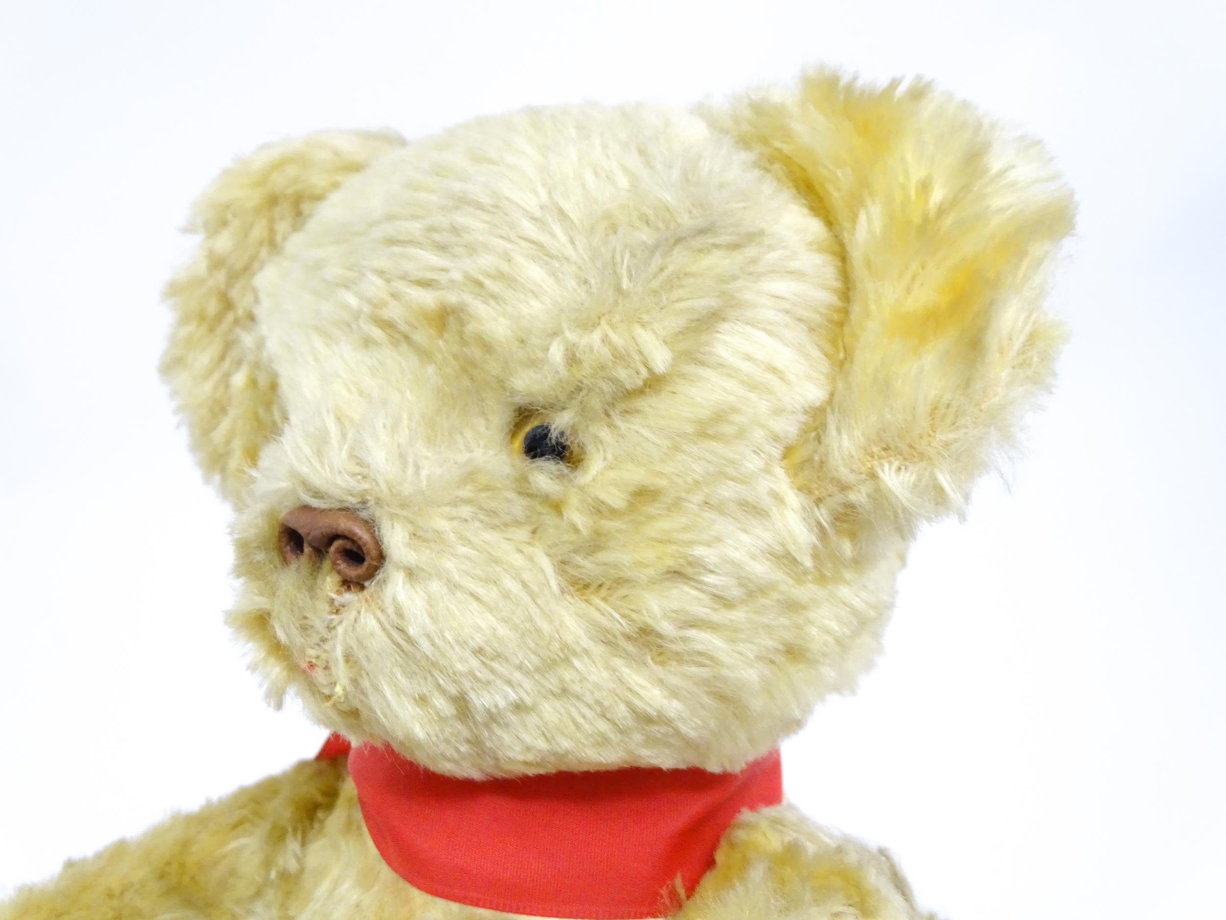 Toy: A 20thC plush teddy bear with scrolled nose, pad paws and articulated limbs. Approx. 11" long - Bild 5 aus 8