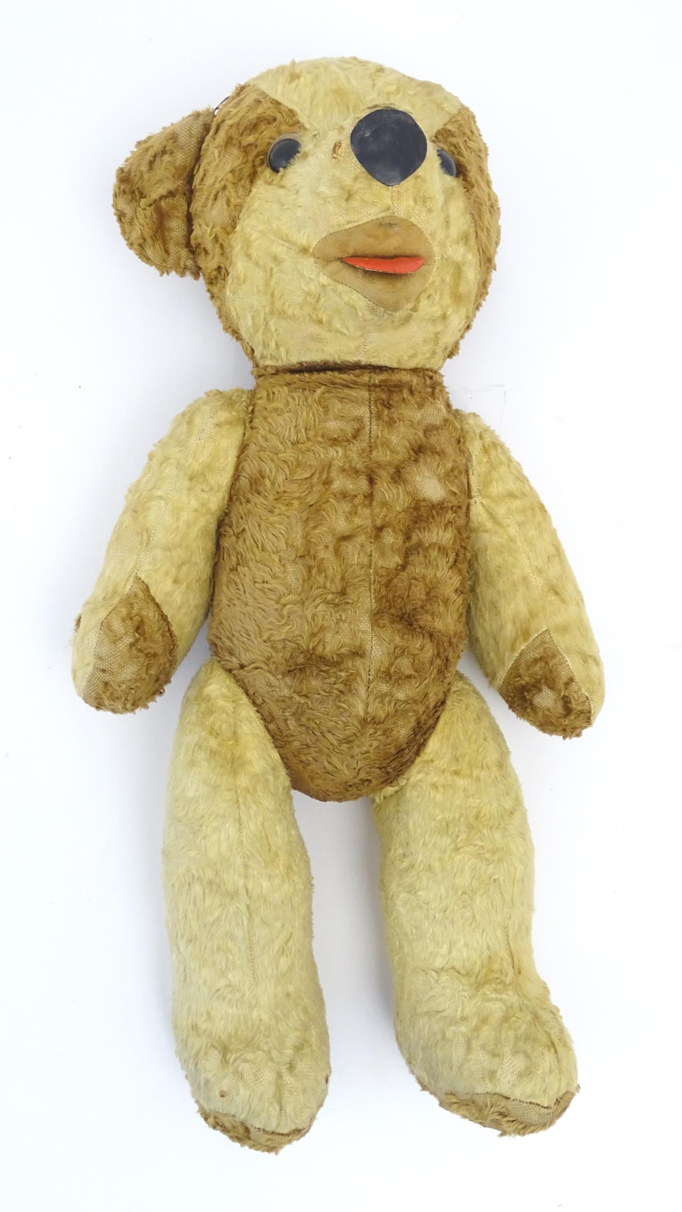 Toy: A 20thC straw filled teddy bear with leather tongue and articulated limbs. Approx. 22 1/2" - Bild 3 aus 7