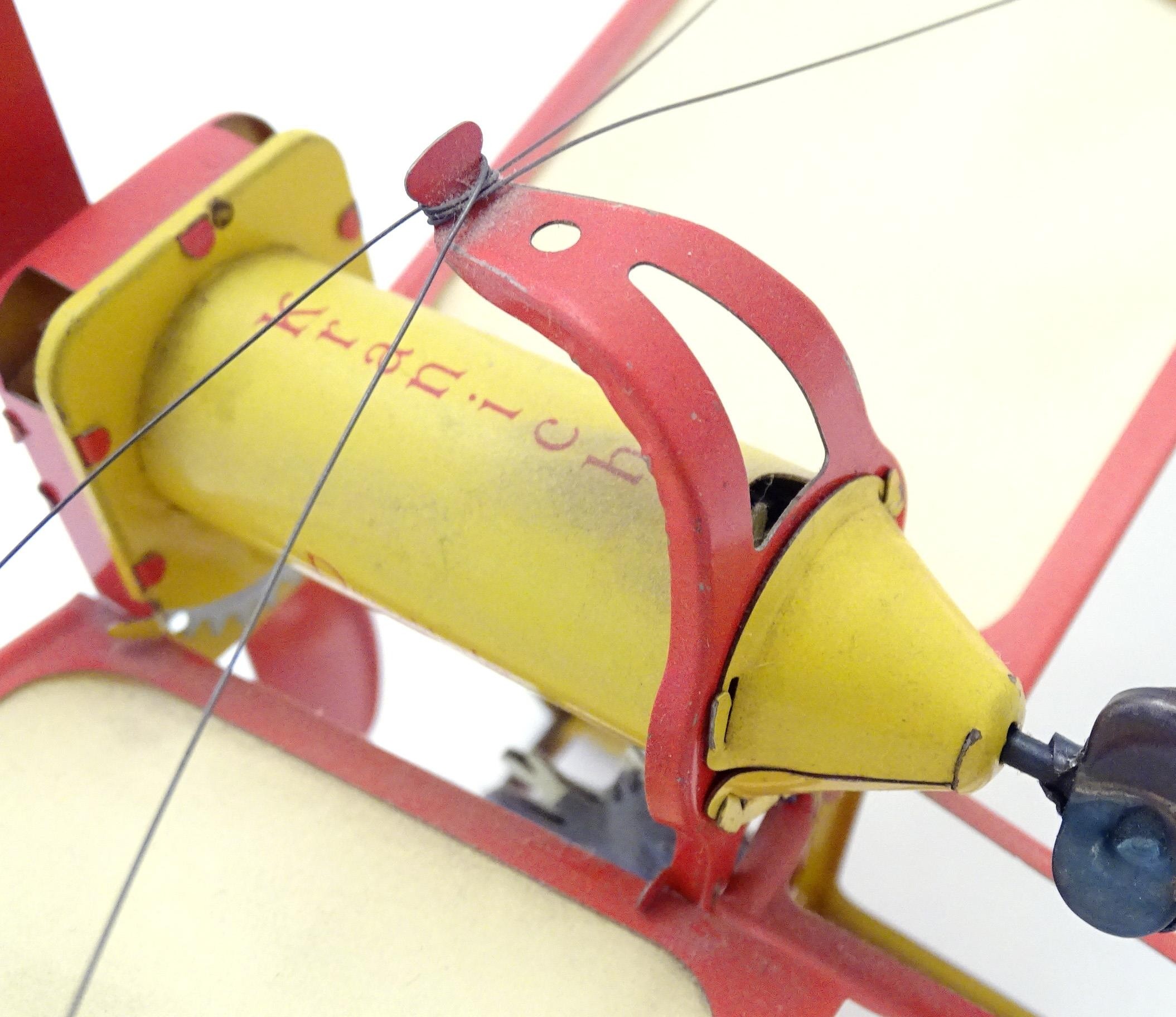 Toy: A 20thC German tinplate clockwork monoplane / aeroplane, Kranich 310. Made by Dusseldorfer - Bild 11 aus 11