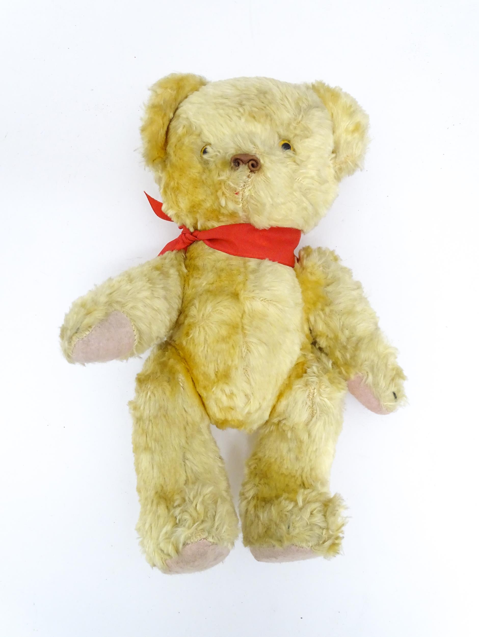 Toy: A 20thC plush teddy bear with scrolled nose, pad paws and articulated limbs. Approx. 11" long - Bild 6 aus 8