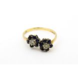 A 9ct gold ring set with diamonds and spinel. Ring size approx. L Please Note - we do not make