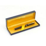 A cased Waterman 'Ideal' fountain pen, measuring 5 1/2" long Please Note - we do not make