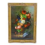 F. Hamilton, 20th century, Oil on canvas, A still life study with flowers in bloom on a marble