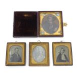 Four Victorian daguerreotype / ambrotype photographic portraits to include a portrait of a seated