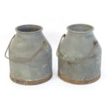 Two galvanised milk / dairy churns with swing handles. Approx. 15" high (2) Please Note - we do