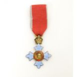 A miniature George VI Commander of the British Empire / CBE medal , with enamelled finish and cipher