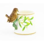 A Victorian Copeland mug, the handle modelled as a wren / bird perched on a looped branch, the