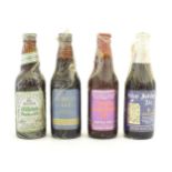 Four Royal commemorative bottles of beer / ales comprising Silver Jubilee Ale by Courage Brewing