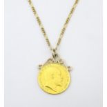 A 1910 half sovereign coin with pendant mount to top, on a 9ct gold chain. Chain approx. 18" long