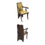 A Regency period rare 'Dug-out' chair, with a single large piece of wood forming the backrest and