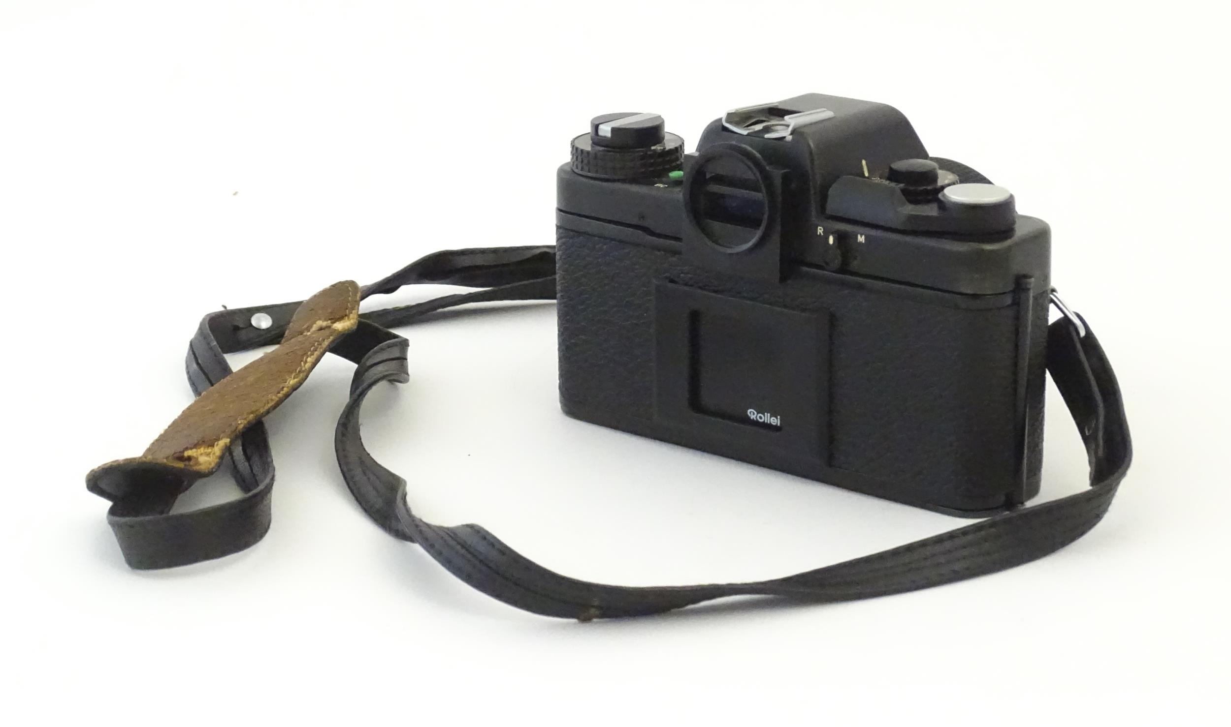 A Rolleiflex SL35 E 35mm film camera, c1970s, cased with lens cap. 5 1/8" Please Note - we do not - Bild 4 aus 10