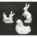 Three Lladro models of animals comprising Hippity Hop rabbit, no. 5886; That Tickles rabbit, no.
