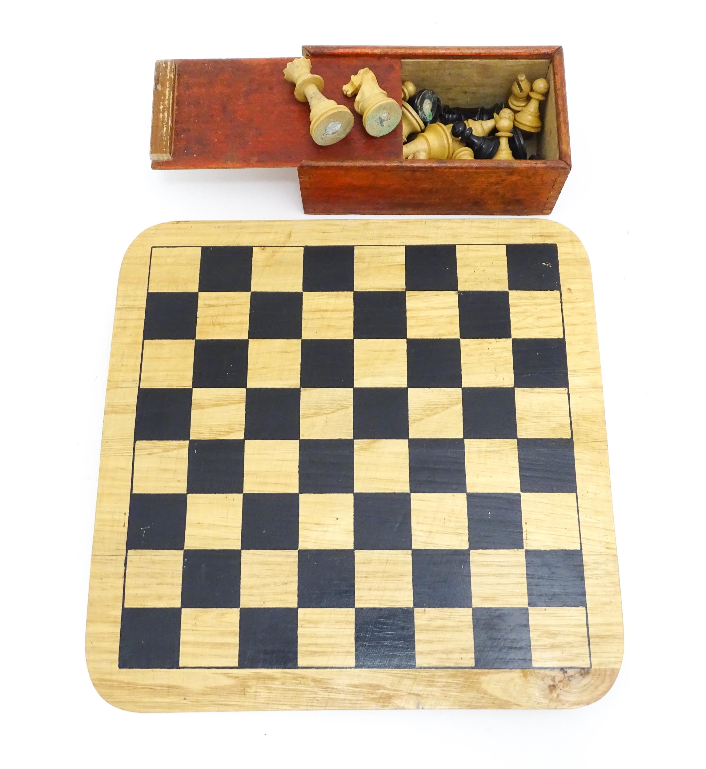 Toys: 20thC carved wood chess set. Together with an 8x8 Draughts games board. King approx. 2 1/2"