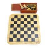 Toys: 20thC carved wood chess set. Together with an 8x8 Draughts games board. King approx. 2 1/2"