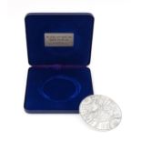 A cased limited edition commemorative silver medallion titled 'The Drake Silver Medal Map, Michael