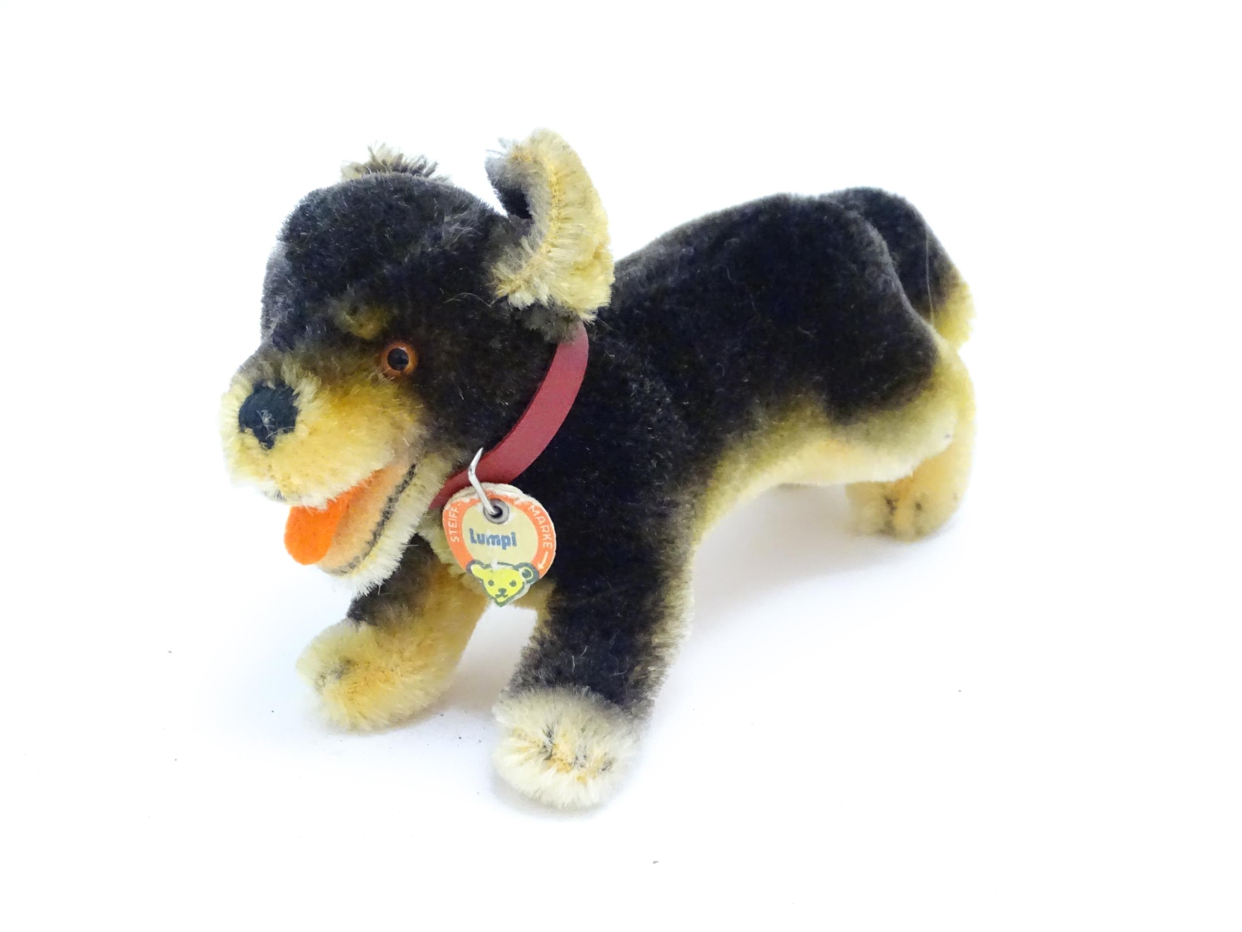 Toy: A 20thC Steiff mohair soft toy modelled as a Dachshund dog - Lumpi, with stitched nose, felt