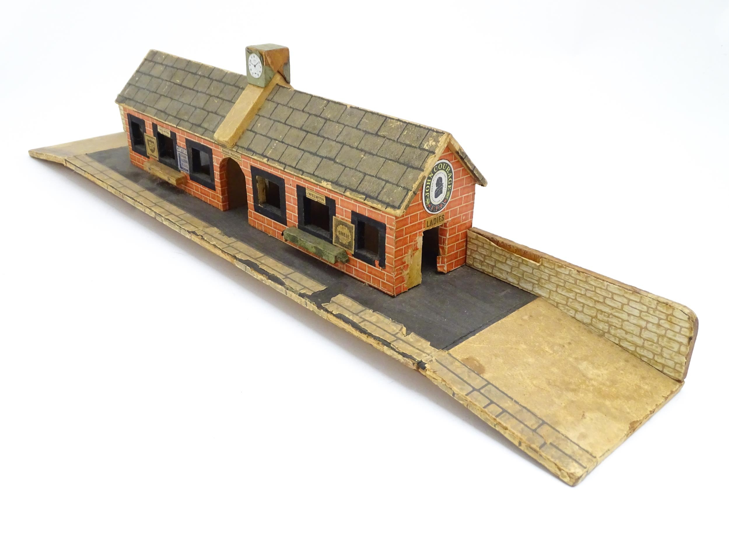 Toys: A 20thC scratch built wooden model railway station / platform with various adverts for - Bild 8 aus 10