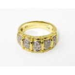A 14ct gold ring set with diamonds. Ring size approx. M 1/2 Please Note - we do not make reference