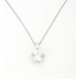 A 9ct white gold chain with pendant set with white stone. Chain approx. 18" long Please Note - we do