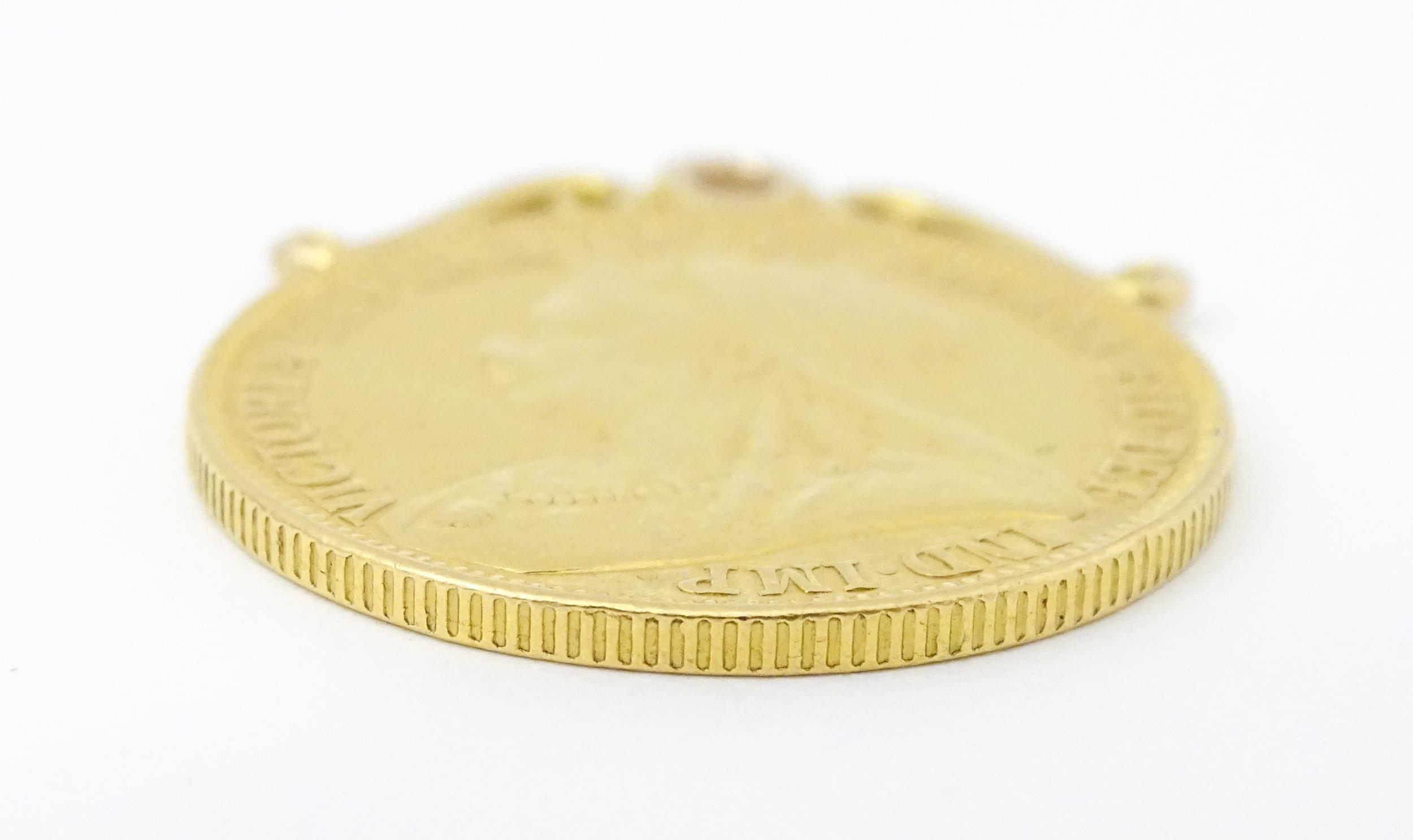 A pendant formed as a Victorian 2 pound / double sovereign with hanging mount to top. Approx 1 1/ - Image 5 of 5