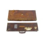 An oak, leather and brass reinforced double gun motor case by Henry Atkin, London, the interior with