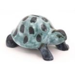 A studio pottery money box modelled as a tortoise by David Sharp for Rye Pottery. Marked under.