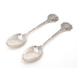 A pair of silver teaspoons the handles surmounted by crest for Miniature Rifle Clubs Society, titled