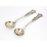 A pair of silver salt spoons. Hallmarked Birmingham 1906 maker Arthur Willmore Pennington. Approx