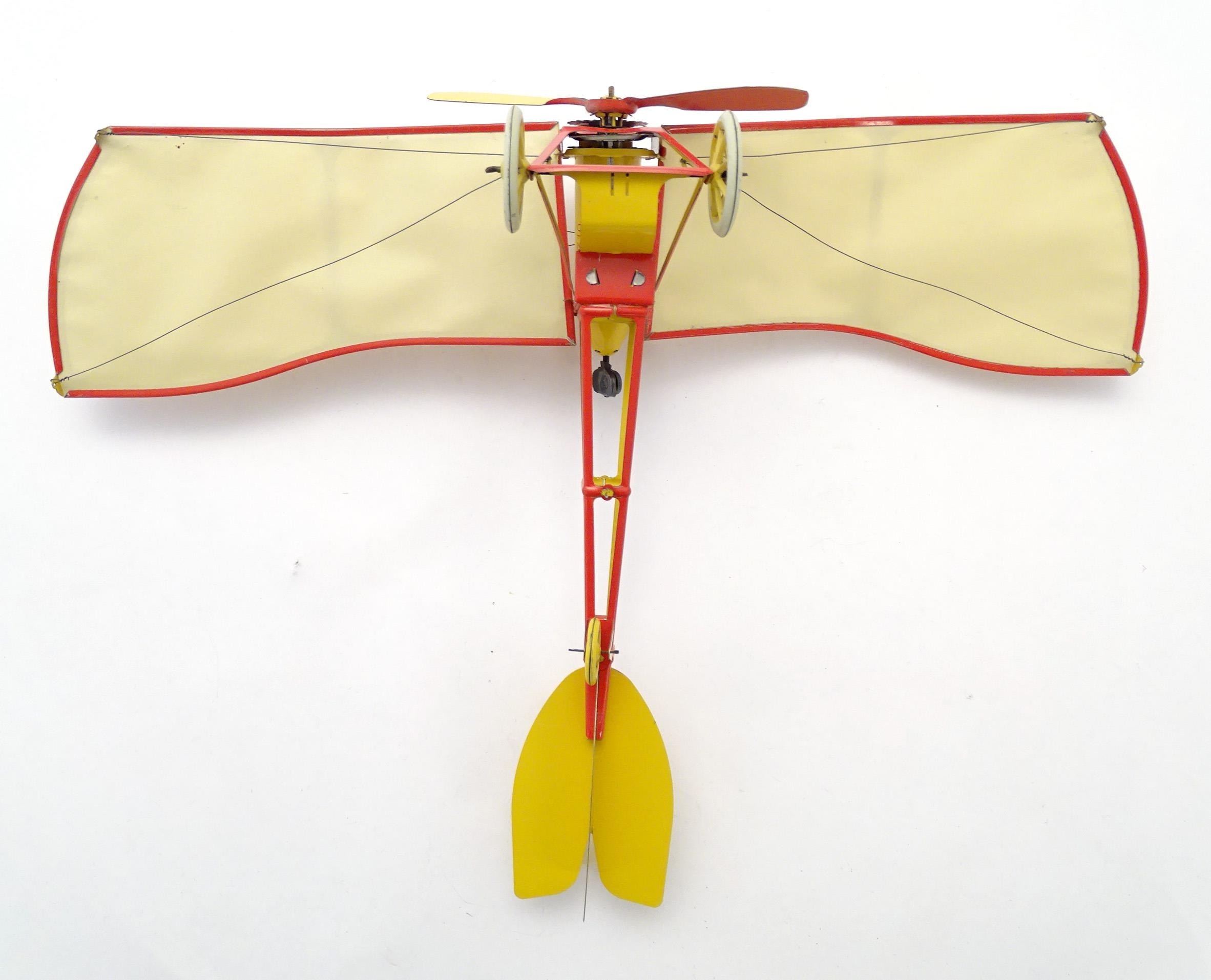Toy: A 20thC German tinplate clockwork monoplane / aeroplane, Kranich 310. Made by Dusseldorfer - Bild 5 aus 11