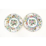 A pair of 19thC Spode plates decorated with a central chinoiserie floral spray within a panelled