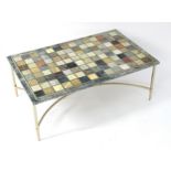 A 20thC marble topped coffee table, the specimen marble top of rectangular form resting on a chromed