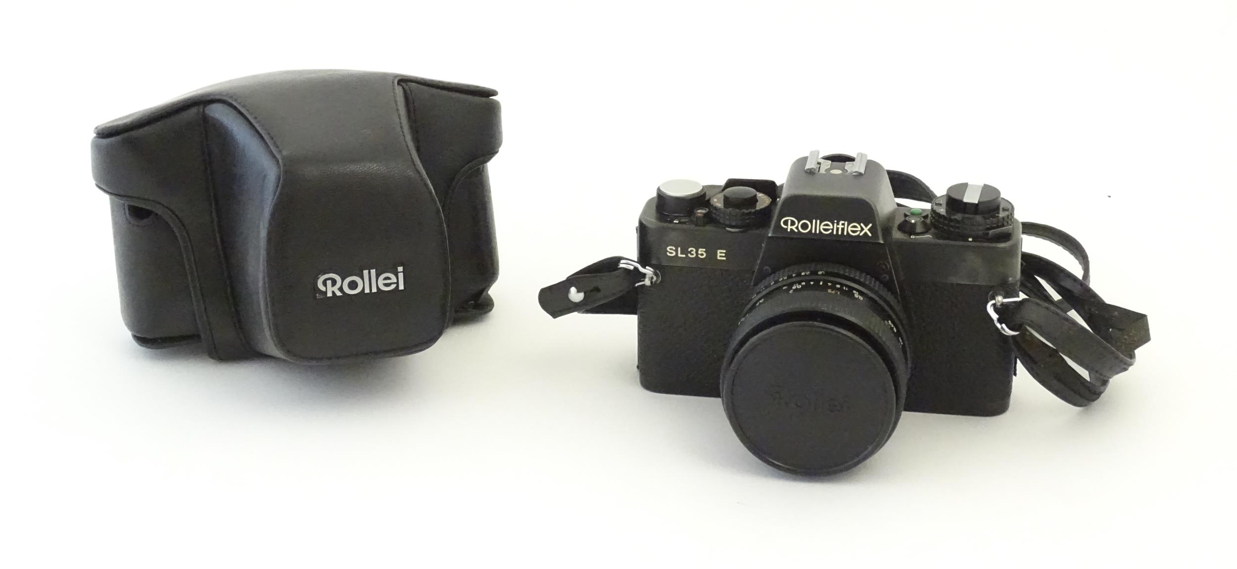 A Rolleiflex SL35 E 35mm film camera, c1970s, cased with lens cap. 5 1/8" Please Note - we do not - Bild 2 aus 10