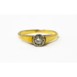 An 18ct gold ring with central illusion set diamond. Ring size approx O Please Note - we do not make