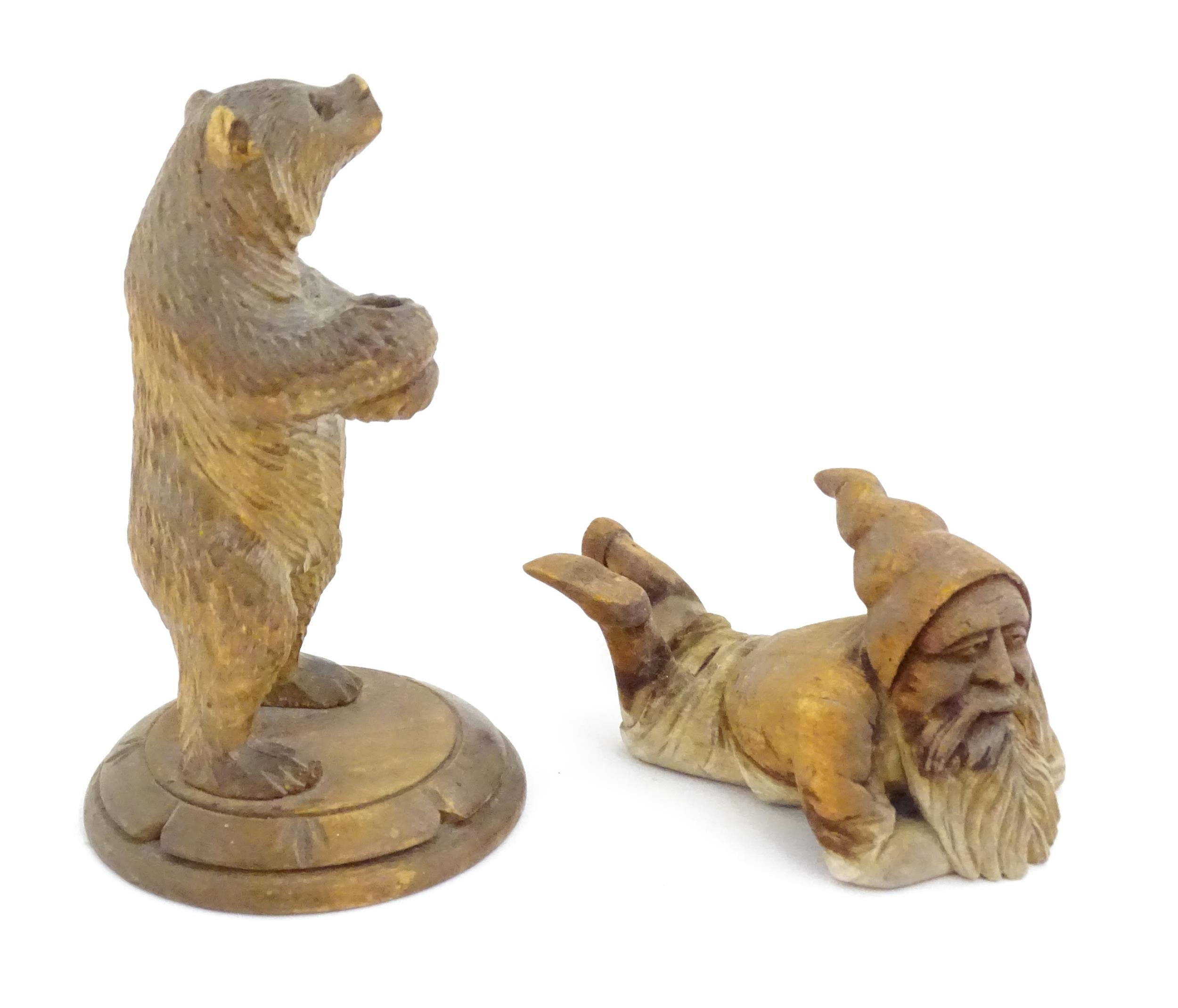 A 20thC Black Forest carved model of a bear. Together with a carved model of a recumbent gnome. - Bild 2 aus 6