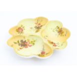 A Royal Worcester three sectional blush ivory serving / hors d'oeuvre dish decorated with flowers