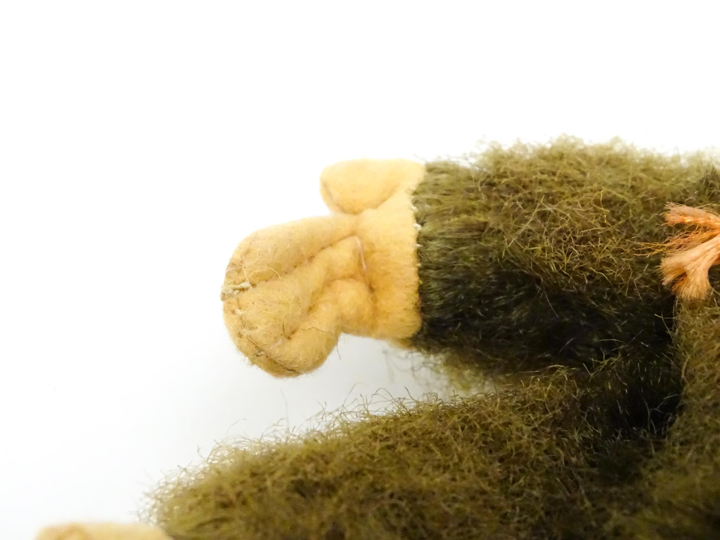 Toy: A small 20thC straw filled soft toy modelled as a monkey / chimpanzee with felt face, ears - Bild 8 aus 8