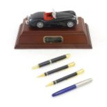 A Parker Pen Vintage Car Treasure Trail trophy, inscribed 24 June 1994. Together with Parker