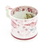 A 19thC frog mug, the exterior decorated with transfer printed birds, flowers and foliage,