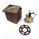 An Optimus No.1 camping stove, with primus ring and tin case, approx 8 1/2" high Please Note - we do