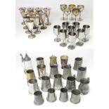 A large quantity of metalware drinking vessels to include pewter tankards, Spanish goblets, etc.