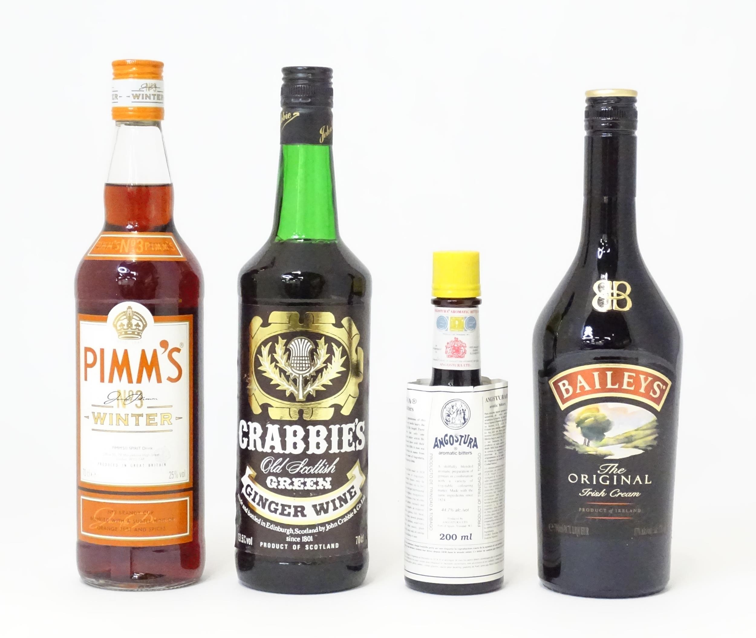 Four assorted bottles of alcohol to include Pimms Winter, Bailey Original Irish Cream, Crabbies