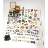 A quantity of assorted jewellery to include brooches, bracelets, earrings etc Please Note - we do