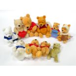 A quantity of assorted Winnie the Pooh soft / cuddly toys to include examples from the Disney Store,