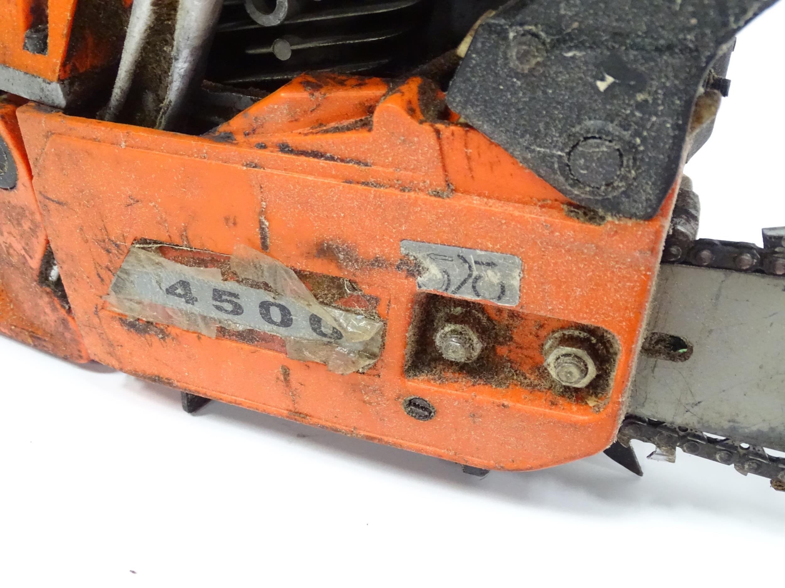 A Tarus 4500 petrol chainsaw, with blade guard, approx 34 1/4" long Please Note - we do not make - Image 3 of 4
